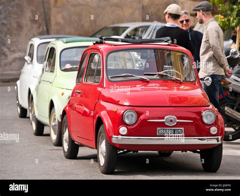 Horizontal View Of Three Classic Fiat 500 S Parked In A Row Stock Photo Horizontal View Of Three Classic Fiat 500 S Parked In A Row Stock Photo