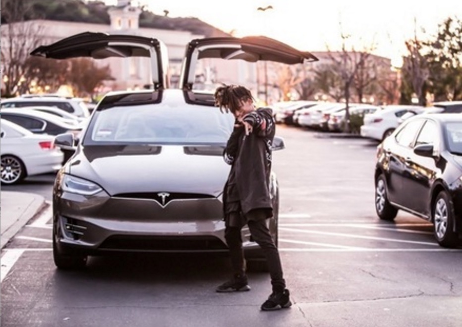 Jaden Smith poses with Tesla Model X