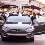 Jaden Smith poses with Tesla Model X