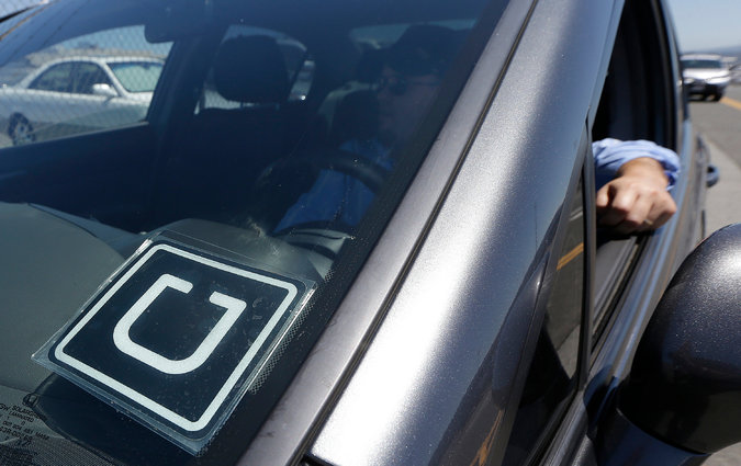 uber logo on windshield