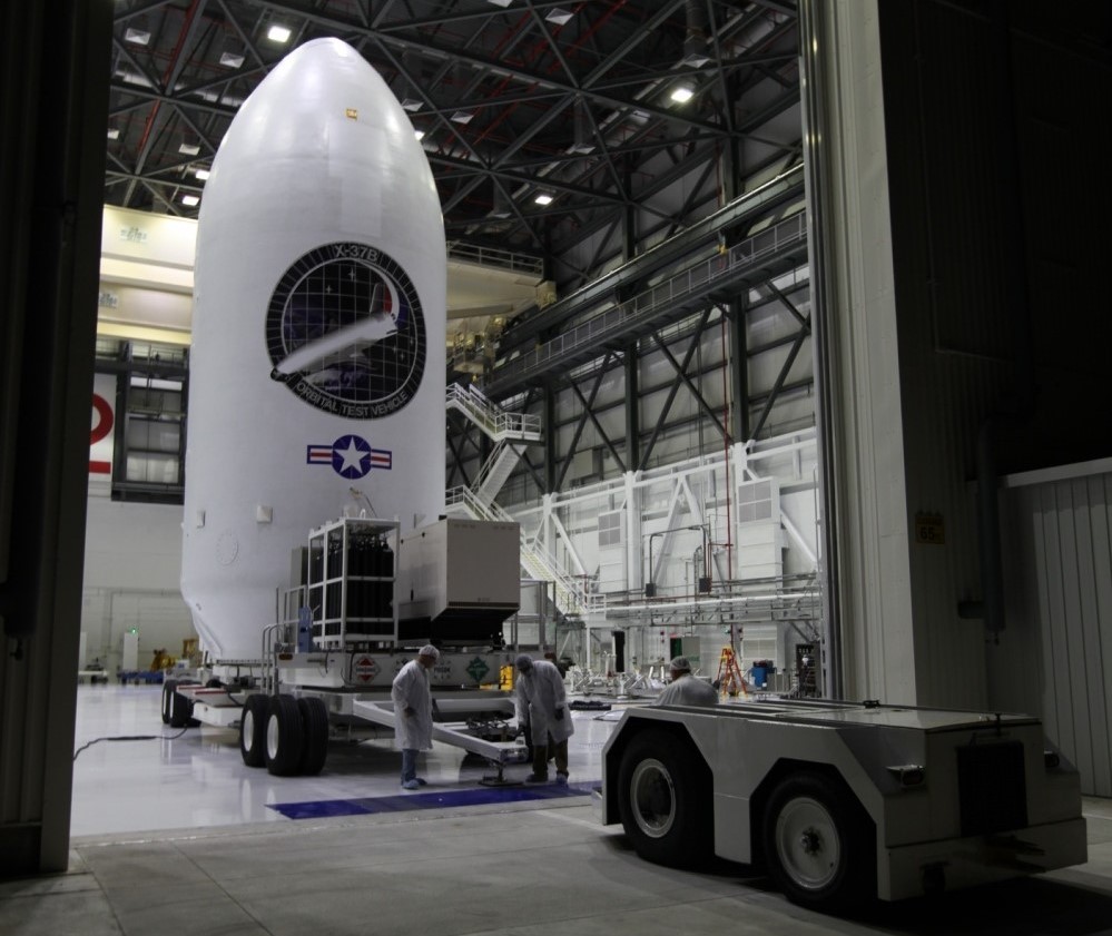 Before being brought to the HIF, SpaceX payloads are integrated vertically within the Falcon's fairing at a nearby facility, often the payload owner's own property. (SpaceX)