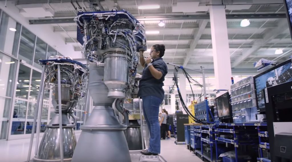 SpaceX technicians wrench on Merlin 1D and Merlin Vacuum engines. (SpaceX)