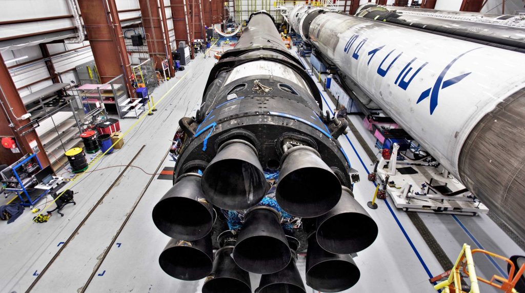 Chances are good that one of the three Falcon 9 boosters to the right is assigned to SpaceX's next launch, its first orbital mission in more than three months. (SpaceX)