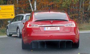 Red Tesla Model S P100D+ badge