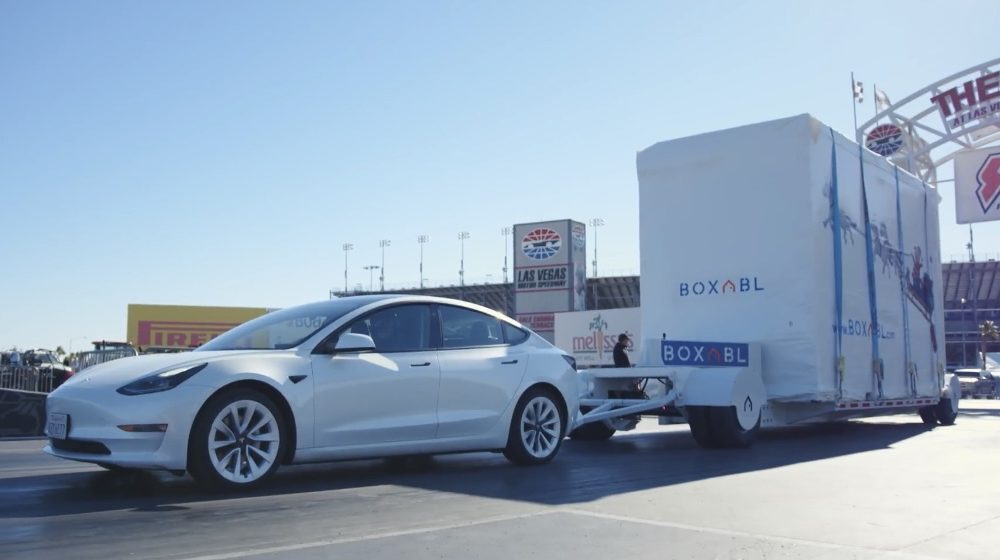 Tesla Model 3 tows a Boxabl house